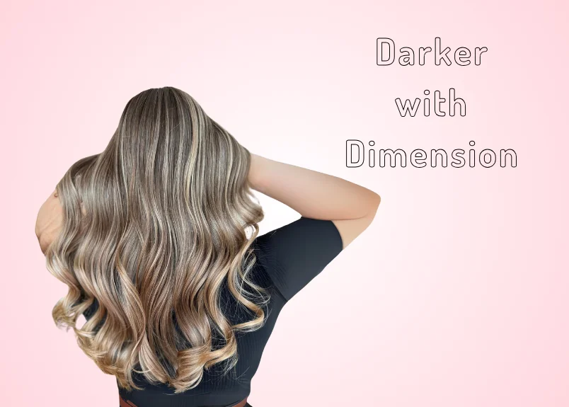 Woman flaunting her darkened hair with highlighted dimension