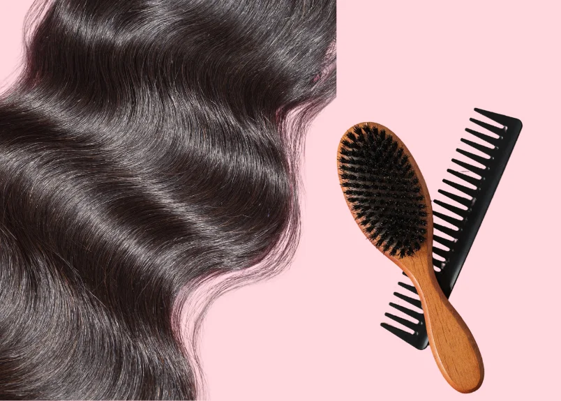 Black hair, brush and comb