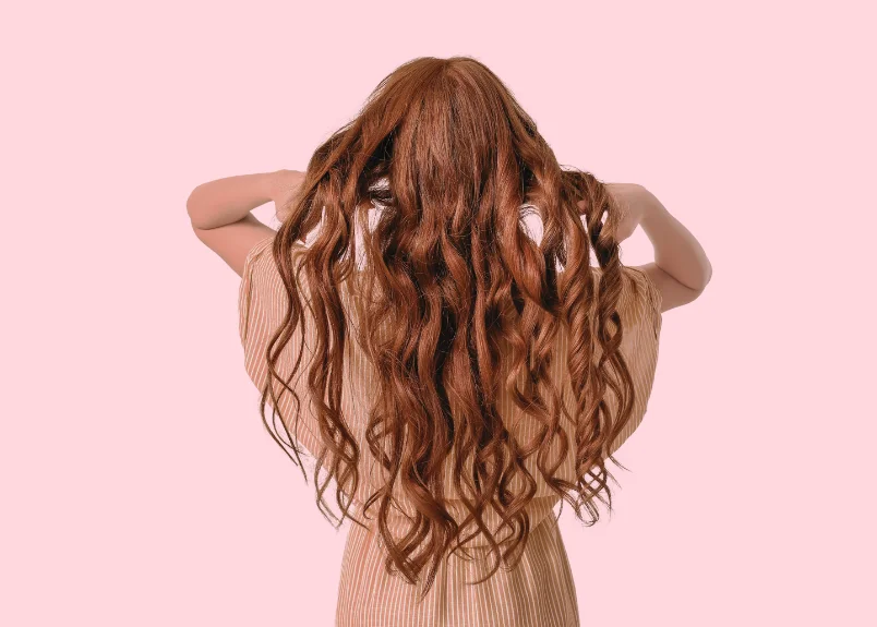 Woman with brush-made curled hair