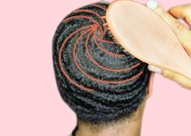 Man brushing his 360 waves hair