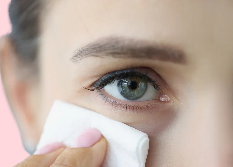 woman using face wipes