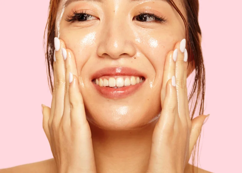 Woman using salicylic acid cleanser