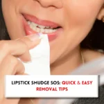 Woman wiping her lipstick with microfibre cloth and text in text box"How to get lipstick off skin?"