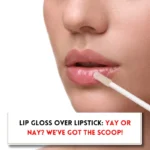 Woman applying lip gloss brush, and text Can you put lip gloss over lipstick?