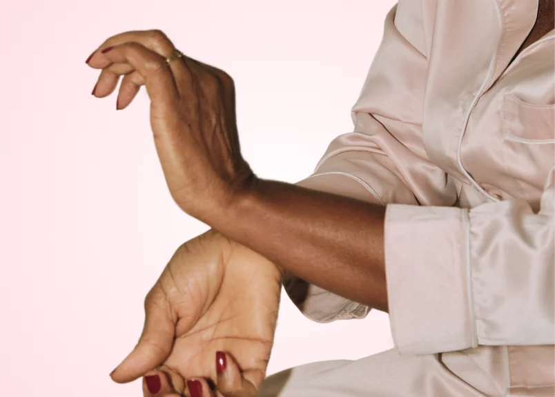 Woman rubbing her wrist together