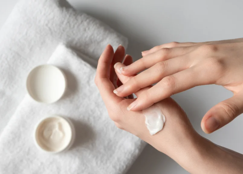 Application of solid perfume on wrist