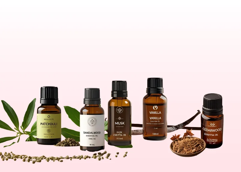 Patchouli, musk, vanilla, sandalwood, cedarwood essence bottle, patchouli leaves and seeds, vanilla stem and flower and cedarwood powder