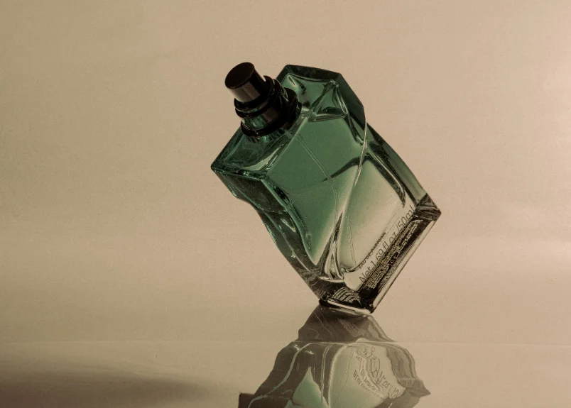 Perfume bottle swirling