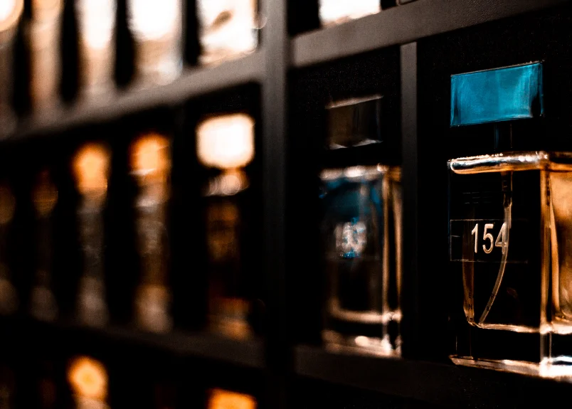 Perfume storage in dark shelves